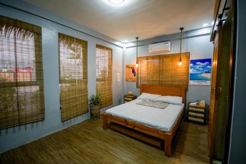 Postel nebo postele na pokoji v ubytování Private Resort in Bulacan with Karaoke and Pool Near Philippine Arena and Manila