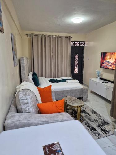 Cama o camas de una habitación en Naiposha Studios