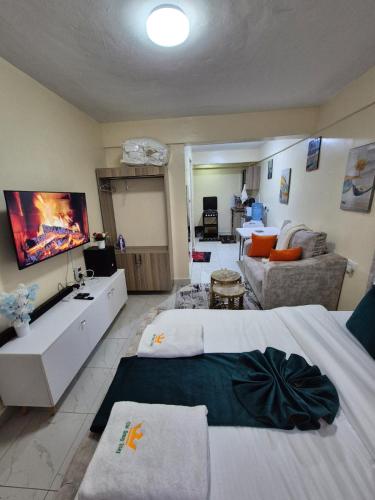 Cama o camas de una habitación en Naiposha Studios