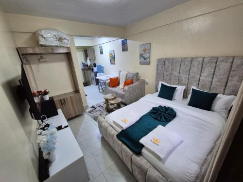 Cama o camas de una habitación en Naiposha Studios
