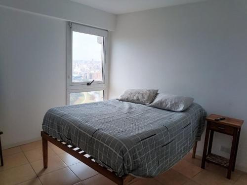 Postel nebo postele na pokoji v ubytování Comodo y luminoso