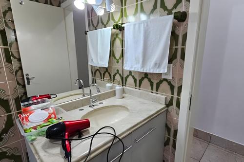 Bilik mandi di Casa com Lareira e Ar Condicionado Bem Localizada