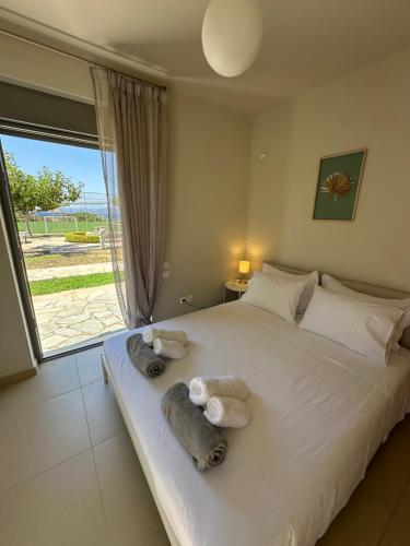 Ένα ή περισσότερα κρεβάτια σε δωμάτιο στο Seaside Villa with Private Football Pitch