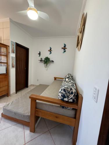 a bedroom with a bed in a room at Apartamento Ilha Comprida à beira-mar térreo in Ilha Comprida