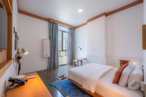 Postel nebo postele na pokoji v ubytování Shada Hotel Dubai - فندق شدا دبي