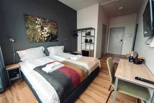 Ένα ή περισσότερα κρεβάτια σε δωμάτιο στο Geo Hotel Grindavik
