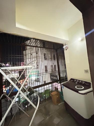 Η κουζίνα ή μικρή κουζίνα στο Saavaa Homestay