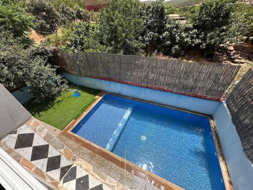 an overhead view of a swimming pool in a backyard at Dar Aguellid in Imouzzer Kandar