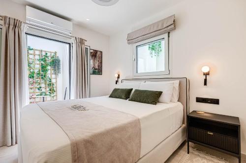 Ένα ή περισσότερα κρεβάτια σε δωμάτιο στο Luxury Villa Rika Corfu- 5 bedrooms with Pool