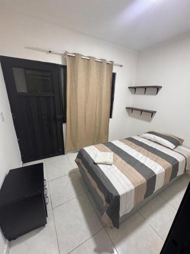 Llit o llits en una habitació de Punto base aérea