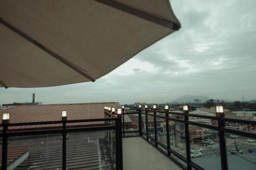 a balcony with a view of a city at THE TIMES HOTEL in Angeles
