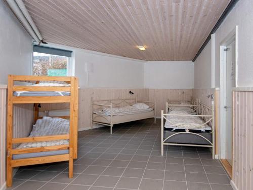 Кровать или кровати в номере 30 person holiday home in Nordborg-By Traum