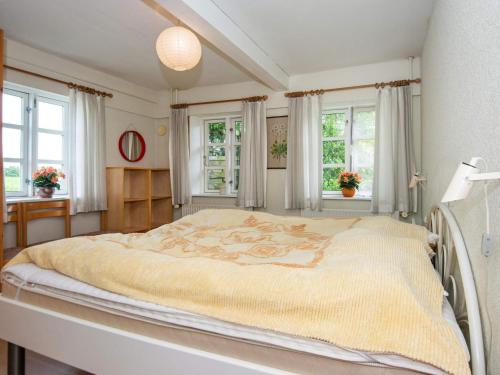 Ένα ή περισσότερα κρεβάτια σε δωμάτιο στο 5 person holiday home in Højer-By Traum