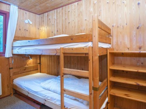 a bedroom with two bunk beds in a cabin at 6 person holiday home in Struer-By Traum in Struer