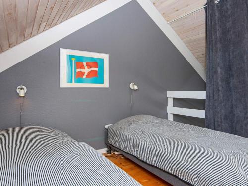 Postel nebo postele na pokoji v ubytování 6 person holiday home in Fanø-By Traum