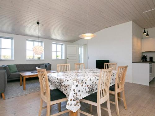 a dining room with a table and chairs at 6 person holiday home in Faaborg-By Traum in Fåborg