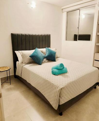 Ένα ή περισσότερα κρεβάτια σε δωμάτιο στο Apartment with amazing forest view close to the Beach