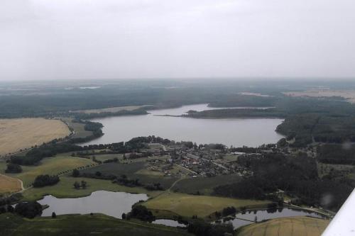 an aerial view of a lake and a city at Reihenhaus am Groß Labenzer See, Klein Labenz in Klein Labenz