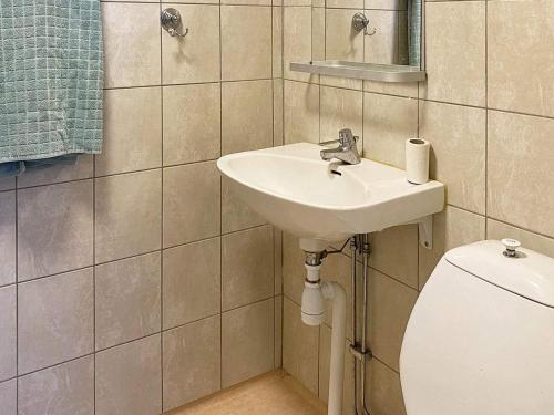 a bathroom with a sink and a toilet at 4 person holiday home in VETLANDA-By Traum in Vetlanda