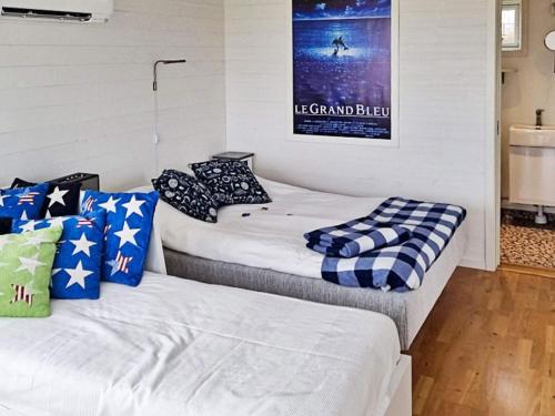two beds sitting next to each other in a room at 3 person holiday home in LÖTTORP-By Traum in Löttorp