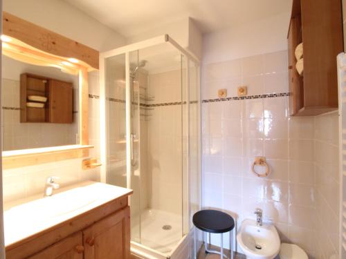 a bathroom with a shower and a sink and a toilet at Appartement 6 pers. avec balcon et accès internet à Aussois - FR-1-508B-53 in Aussois