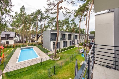 2-story holiday home with a garden and a pool