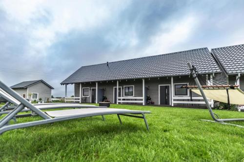 Air-conditioned holiday homes, summer pool, sauna