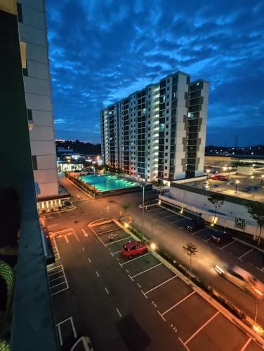 an empty parking lot in a city at night at ss syukur homestay desaru utama in Bandar Penawar