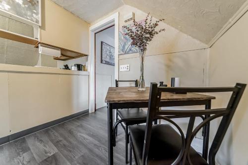 a dining room with a table and chairs at Just Like Home in Cleveland