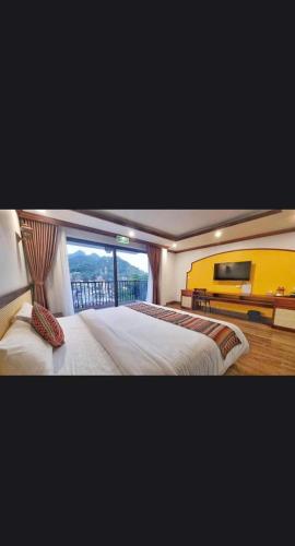 Ένα ή περισσότερα κρεβάτια σε δωμάτιο στο Lechapa Hotel Sapa