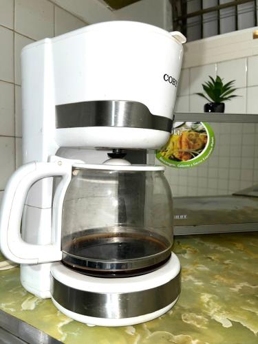a food processor sitting on top of a kitchen counter at Comfort and an excellent area in Venezuela in Maracaibo