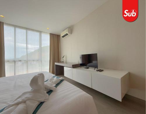 Ένα ή περισσότερα κρεβάτια σε δωμάτιο στο Modern Cozy Room in Hat Yai