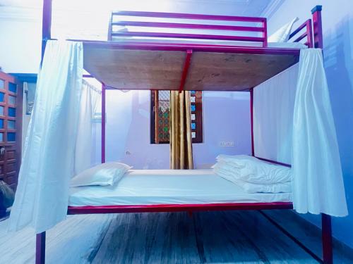 Postel nebo postele na pokoji v ubytování Little Jaisal - Boutique Hotel