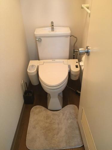 Ένα μπάνιο στο Apartment in Narita 123