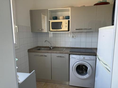 Dapur atau dapur kecil di Résidence Beau rivage