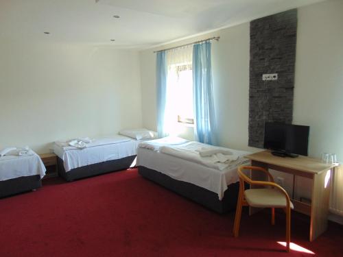 Hotel Isoraにあるベッド