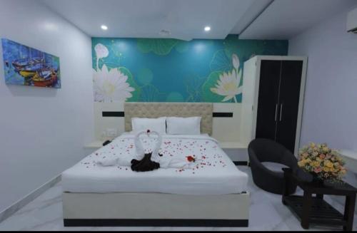 HoTEL LALITHA ELITEにあるベッド