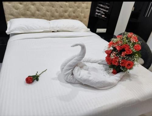 HoTEL LALITHA ELITEにあるベッド