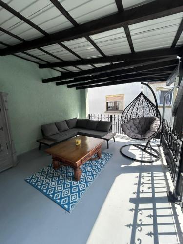 a living room with a couch and a chair at Excellent house in Ediger-Eller