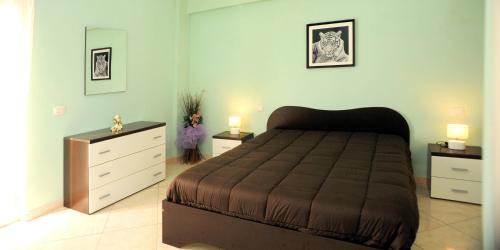 Säng eller sängar i ett rum på Casa Vacanza la Rondine
