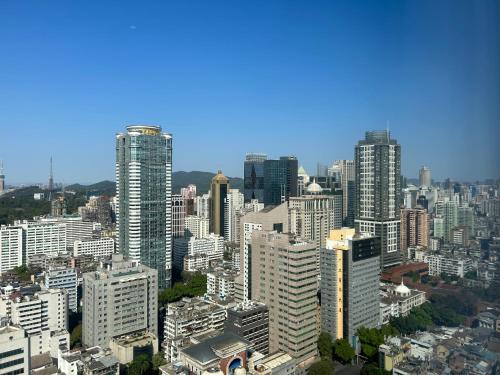 an aerial view of a city with tall buildings at Pengman Beijing Road A-mall Apartment - Free Shuttle to Canton Fair in Guangzhou
