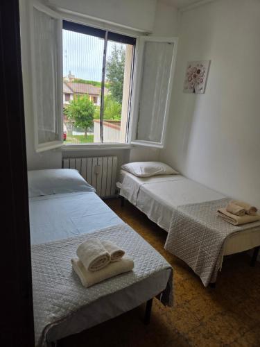 Postel nebo postele na pokoji v ubytování Casa Nanà Beach