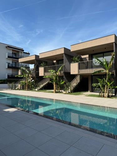 Bazén v ubytování Luxury Apartament Jesolo Piscina e Mare a 5 min nebo v jeho okolí