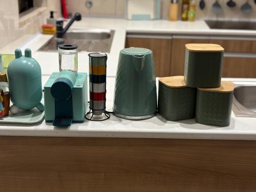 a counter top with a bunch of items on it at Dave Place - 3 Bedroom House in Alte