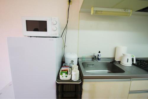 Nhà bếp/bếp nhỏ tại オンブラージュ九203