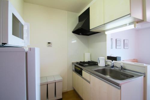 Nhà bếp/bếp nhỏ tại オンブラージュ704号室