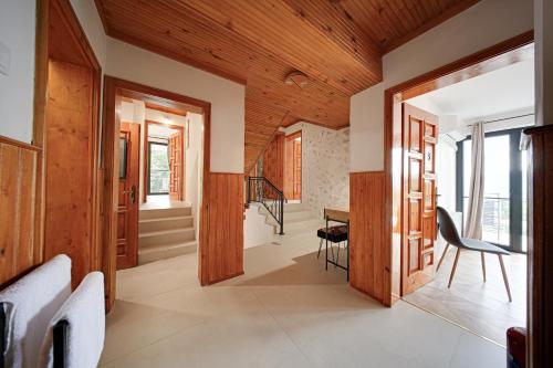 a home office with a wooden ceiling at Villa High Point in Pravets