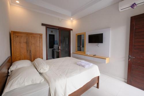 Katil atau katil-katil dalam bilik di Shankara Guest House