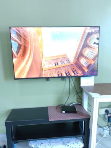 TV a/nebo společenská místnost v ubytování ZH Studio Apartment Gua Musang With WIFI dan POOL