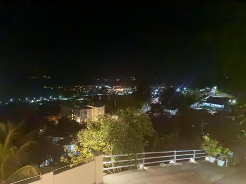 a view of a city at night with lights at 180 Degrees Self-Catering in Victoria